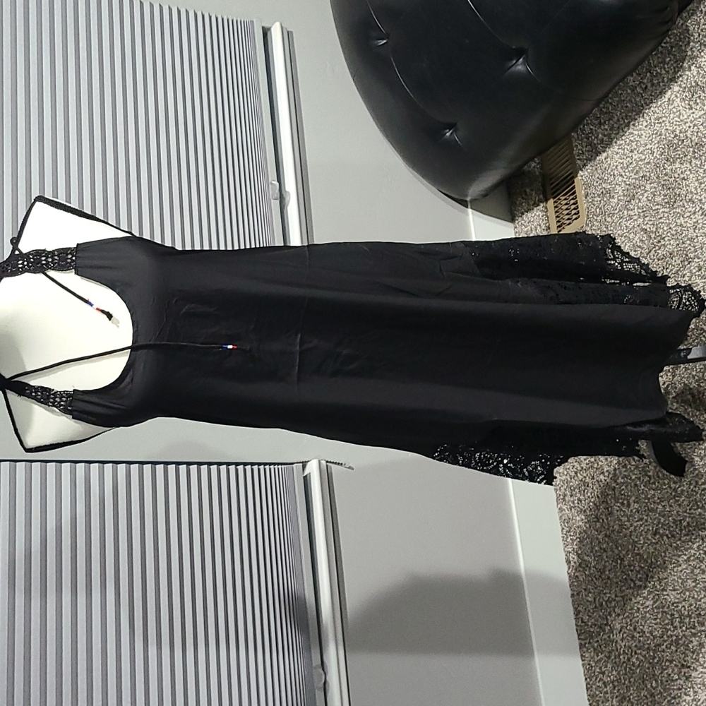 Black slip dress size M, no name brand, new in bag.